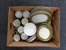 A box of Denby tea and dinner ware