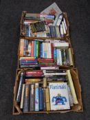 Two boxes of hard back and paper backed books,