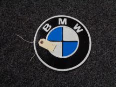 A metal BMW plaque