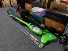 A metal concertina tools box containing hand tools, extension reel, walking sticks,