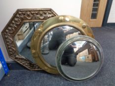 An octagonal brass framed mirror together with a circular framed brass porthole mirror and chrome