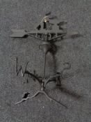 A metal Blacksmith weather vane