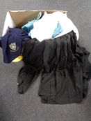 A box of antique and later clothing, two black robes, christening gowns,