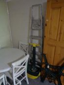 A set of aluminium folding steps and a feed spreader