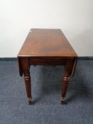 A Victorian mahogany Pembroke table
