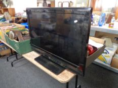A Toshiba Regza 32 inch lcd tv with lead, no remote,