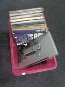 A box of Sony dvd player with remote, tv aerial,