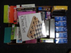 Two boxes of new sealed board games and jigsaws, paw patrol,