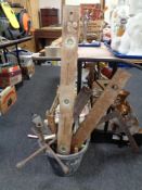 A plastic bucket of vintage hand tools,
