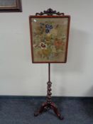 A Victorian mahogany barley twist pole screen with tapestry panel