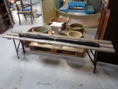 A folding wooden bench and a Daiwa two piece fishing rod