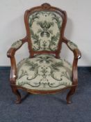 A continental walnut armchair in tapestry fabric