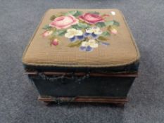An antique mahogany storage stool