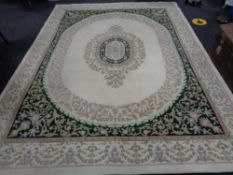 A floral Indian carpet on cream ground