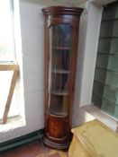 An Italian style corner display cabinet