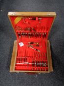 Two teak canteens of Thai cutlery