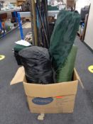 A box of camping equipment to include tent, folding chair,