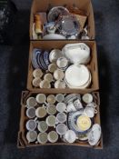 Four boxes of china, Willow pattern, commemorative mugs,