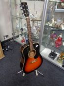 A SX acoustic guitar,