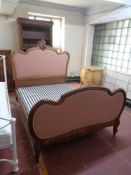 An antique walnut French 4'6 bed frame