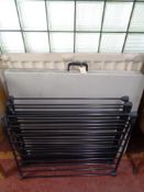 A folding trestle table and a folding clothes airer
