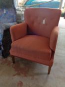 A mid century continental armchair in corded fabric