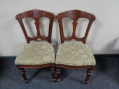 A pair of Victorian mahogany dining chairs