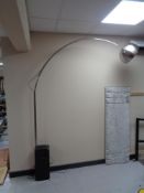 A 20th century floor lamp on a black marble base