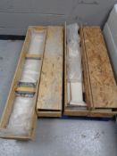 A lime stone fire place in wooden crate