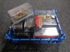 A crate of die cast vehicles, model tank,