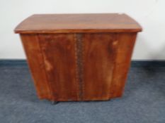 A mid 20th century cocktail cupboard