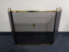 A three way folding spark guard