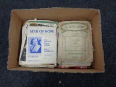 A box of sheet music