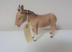 A Beswick donkey.