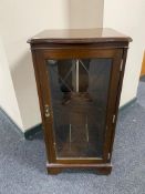 An inlaid mahogany audio cabinet