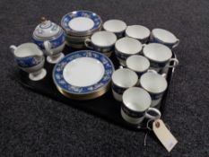 A tray of twenty eight pieces of Wedgwood blue Siam tea china