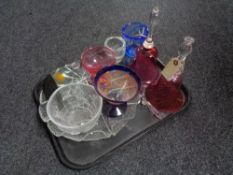 A tray of assorted glass ware to include two cranberry glass wedding bells,