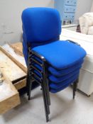 Five metal framed stacking office chairs