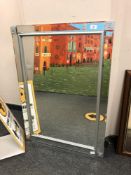 A contemporary all glass mirror,