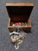 A brass inlaid hardwood jewellery box, costume jewellery,