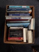 A box of books relating to art