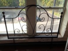 A 5' metal headboard