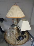 An Indian embossed brass plaque,