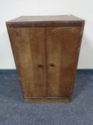 A 20th century oak record cabinet