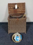 An early 20th century wicker fisherman's stool basket with canvas and leather straps,