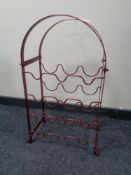 A wrought iron wine rack