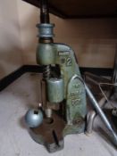 An industrial drill press