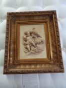 A gilt framed relief plaque - mother with child