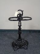 A painted cast iron stick stand