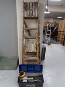 Two sets of folding wooden garden steps and a garden plastic box of hand tools